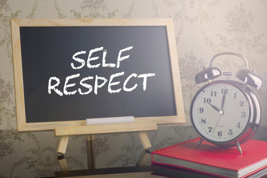 Self Respect on blackboard with flare and clock.